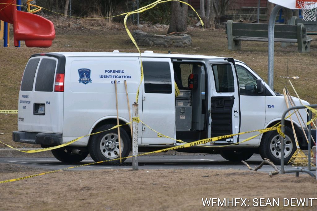 Police clear scene on Elliott Street in Dartmouth .