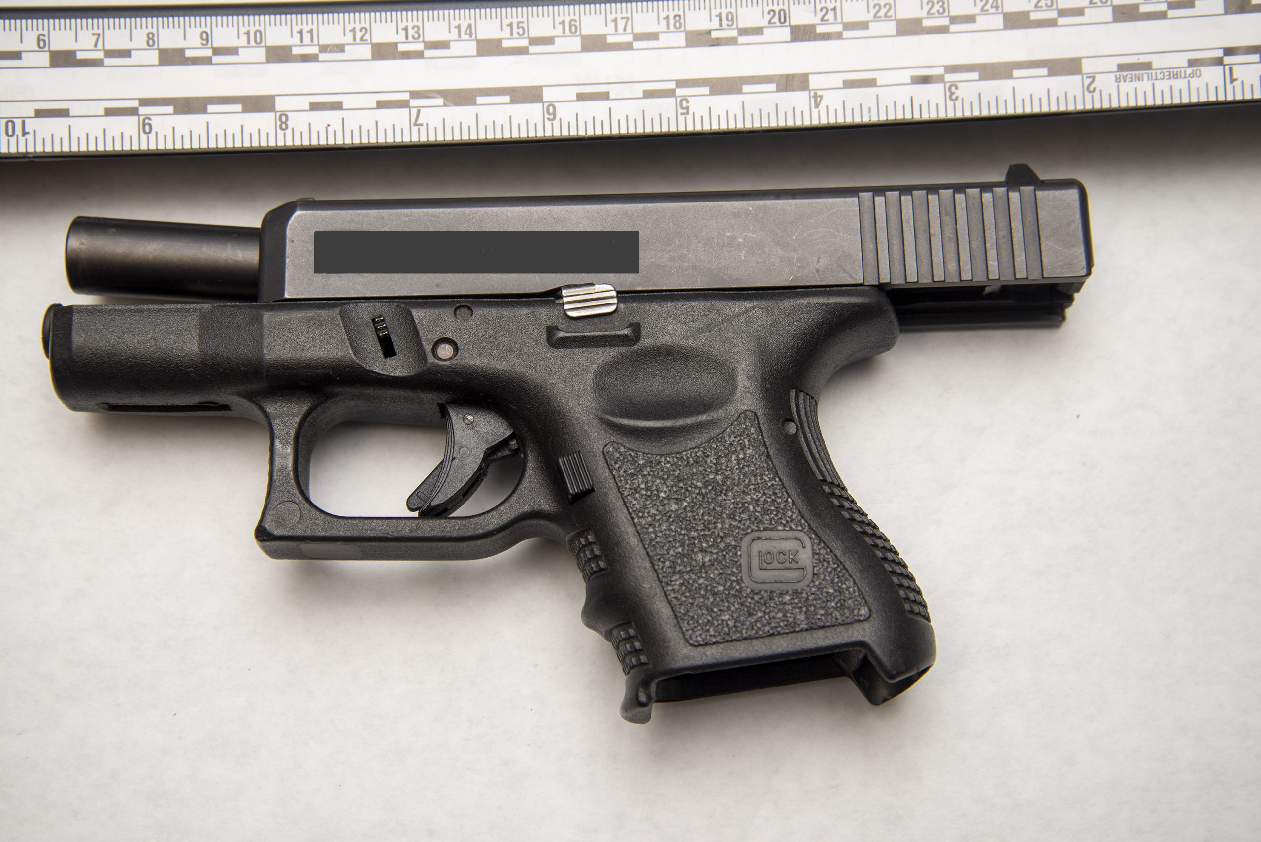 Police charge two people with weapons offences