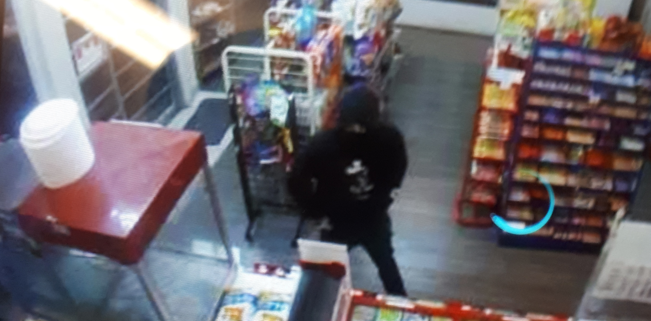 Police continue to investigate robbery and release photo of suspect