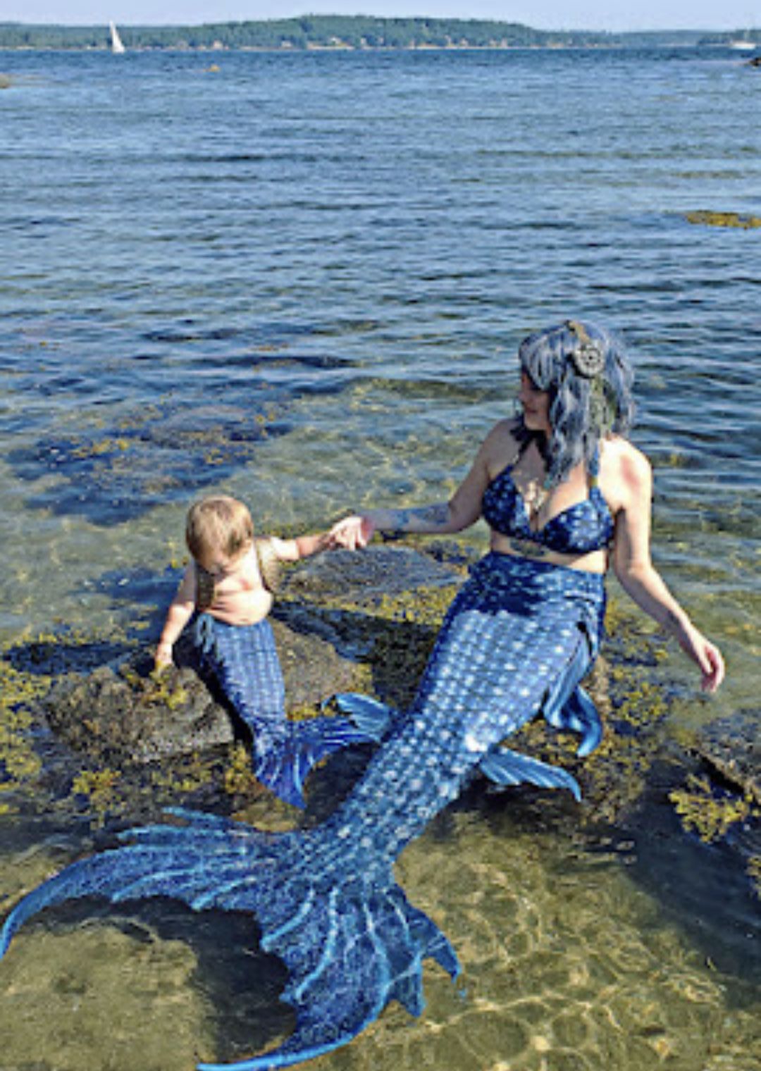 Local Mermaid Performer and Mother Go Viral on Youtube with Infant Son; Awarded "Silver Play Button"