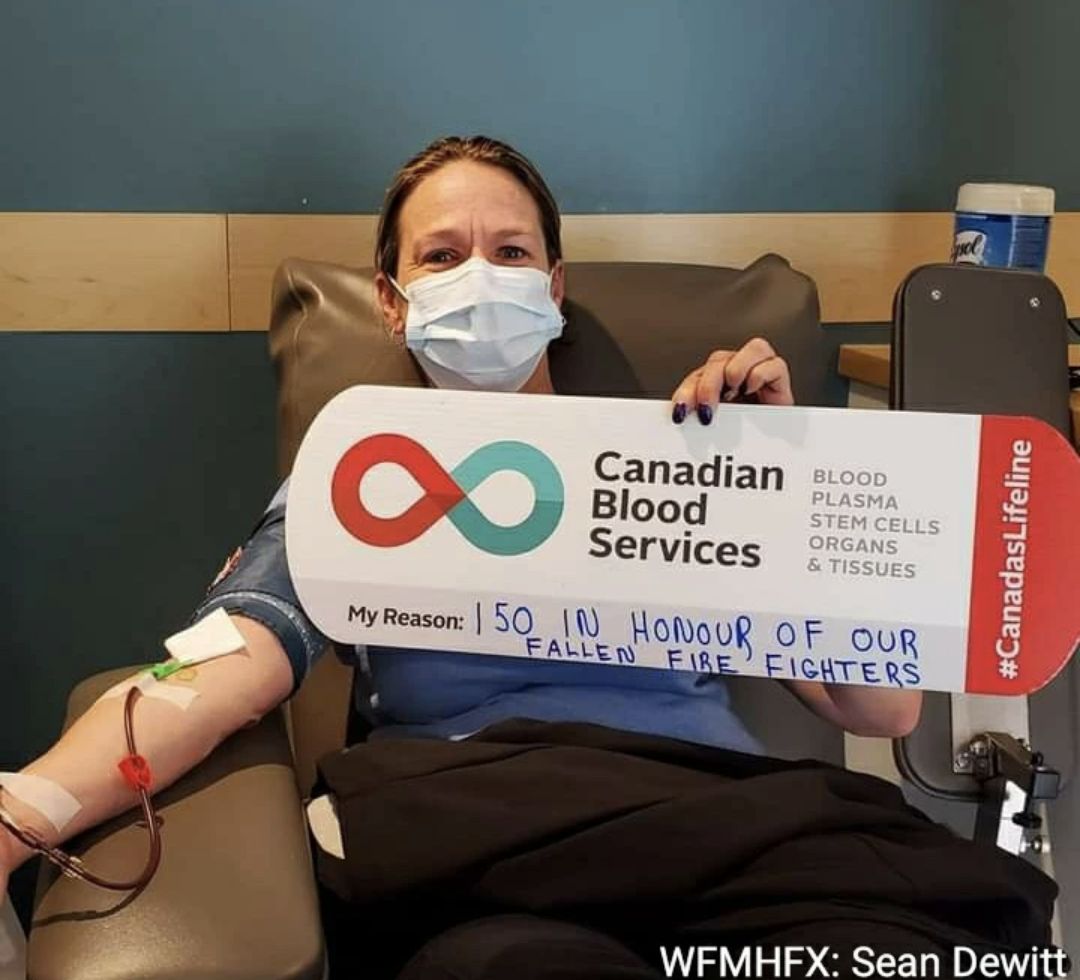 HRFE Capt Thompson on her 200th donation at Canadian Blood Services