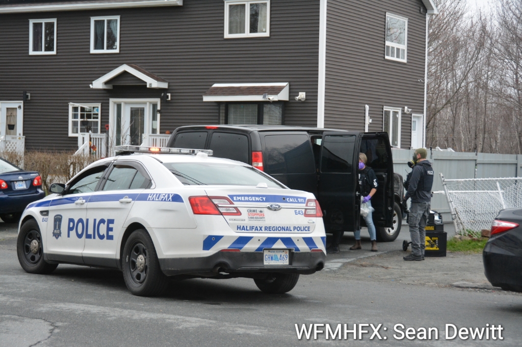 Police have laid firearms and drug trafficking charges in relation to searches in Dartmouth