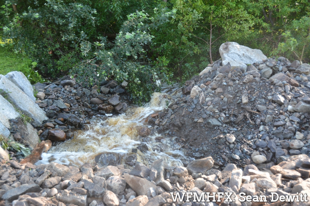 Nearly 500 sections of damaged paved and gravel roads and 60 road shoulders have been repaired since last weekend's record storm