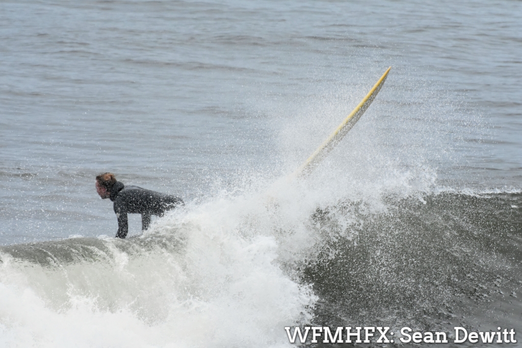 Surfers get into the swing of things as waves swell up ahead of Hurricane Lee