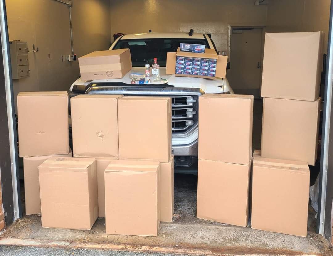 Driver determined to be impaired and was found in possession of 16 cases of illegal cigarettes, cannabis and liquor