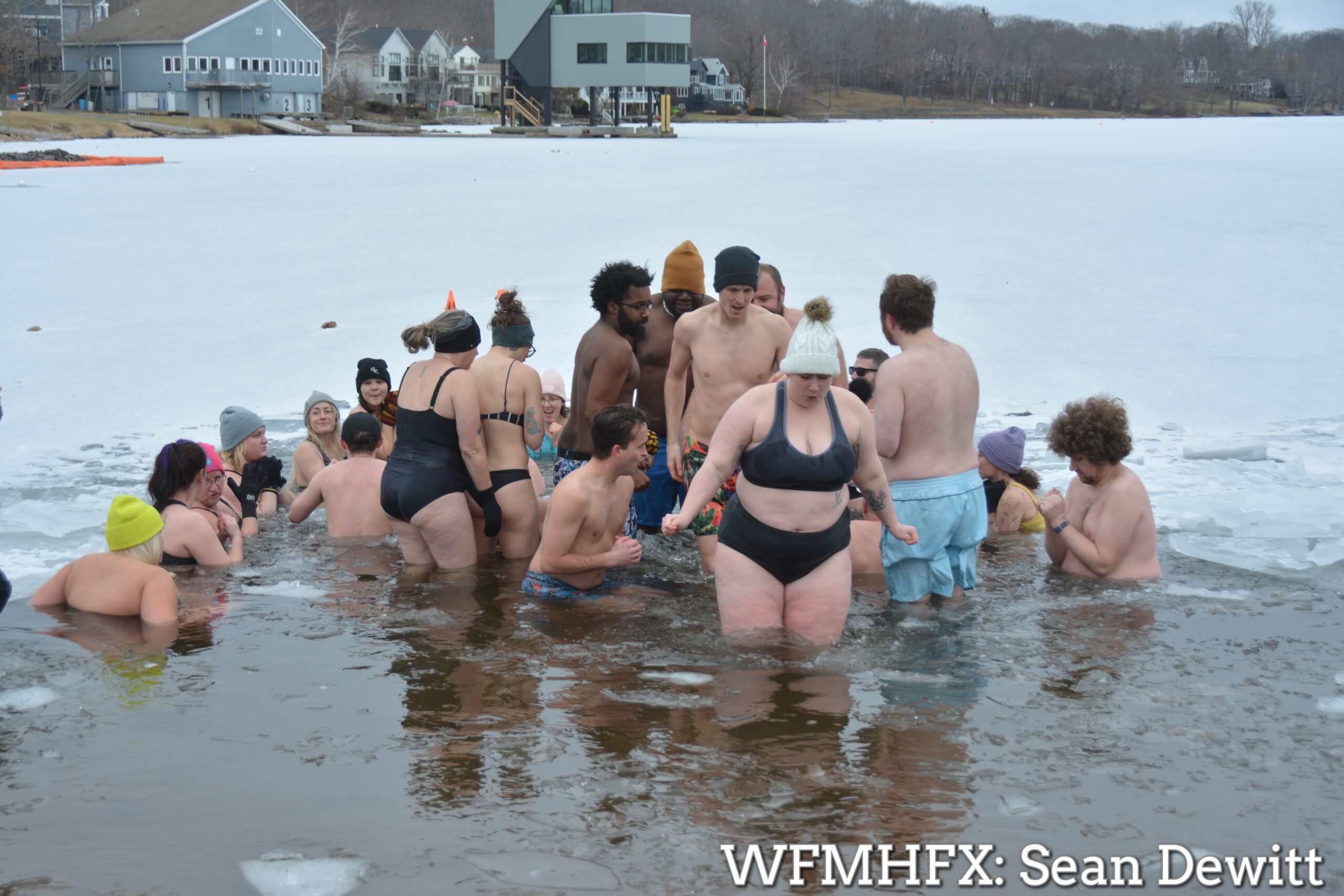 Dozens of dippers took an icy plunge into a lake in Dartmouth earlier