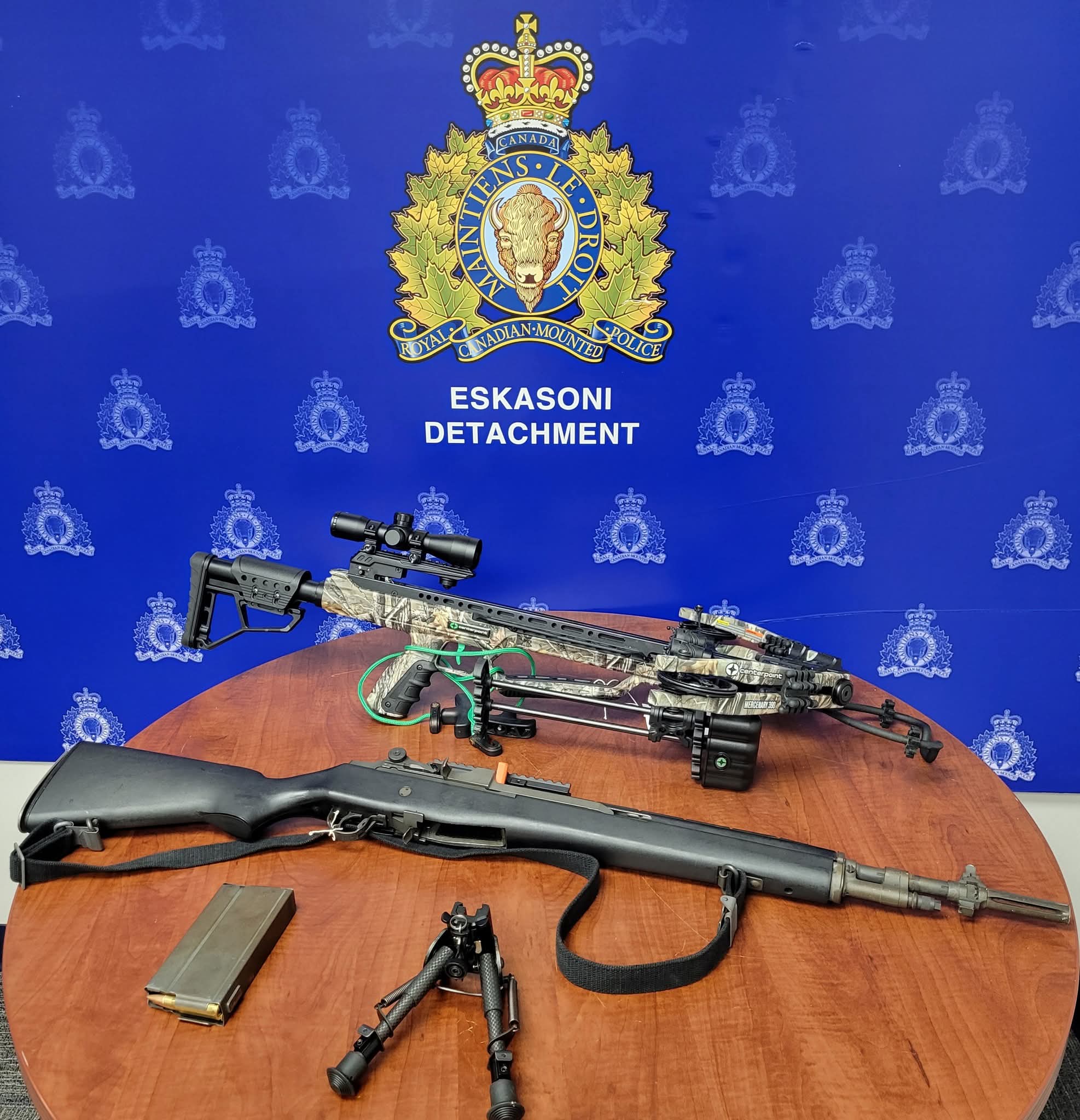 Eskasoni RCMP has charged a man with several weapons offences and officers seized a firearm and a crossbow after a weapons call