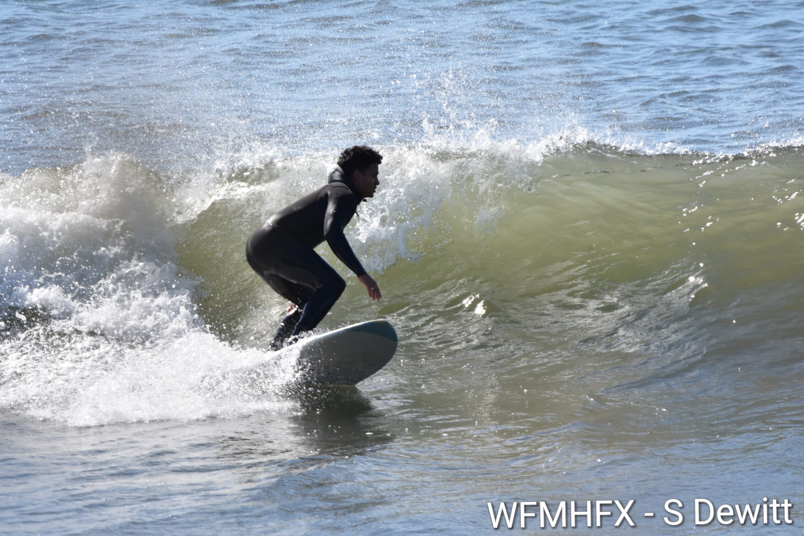 Sun's out, surf's up on a beautiful long weekend Sunday