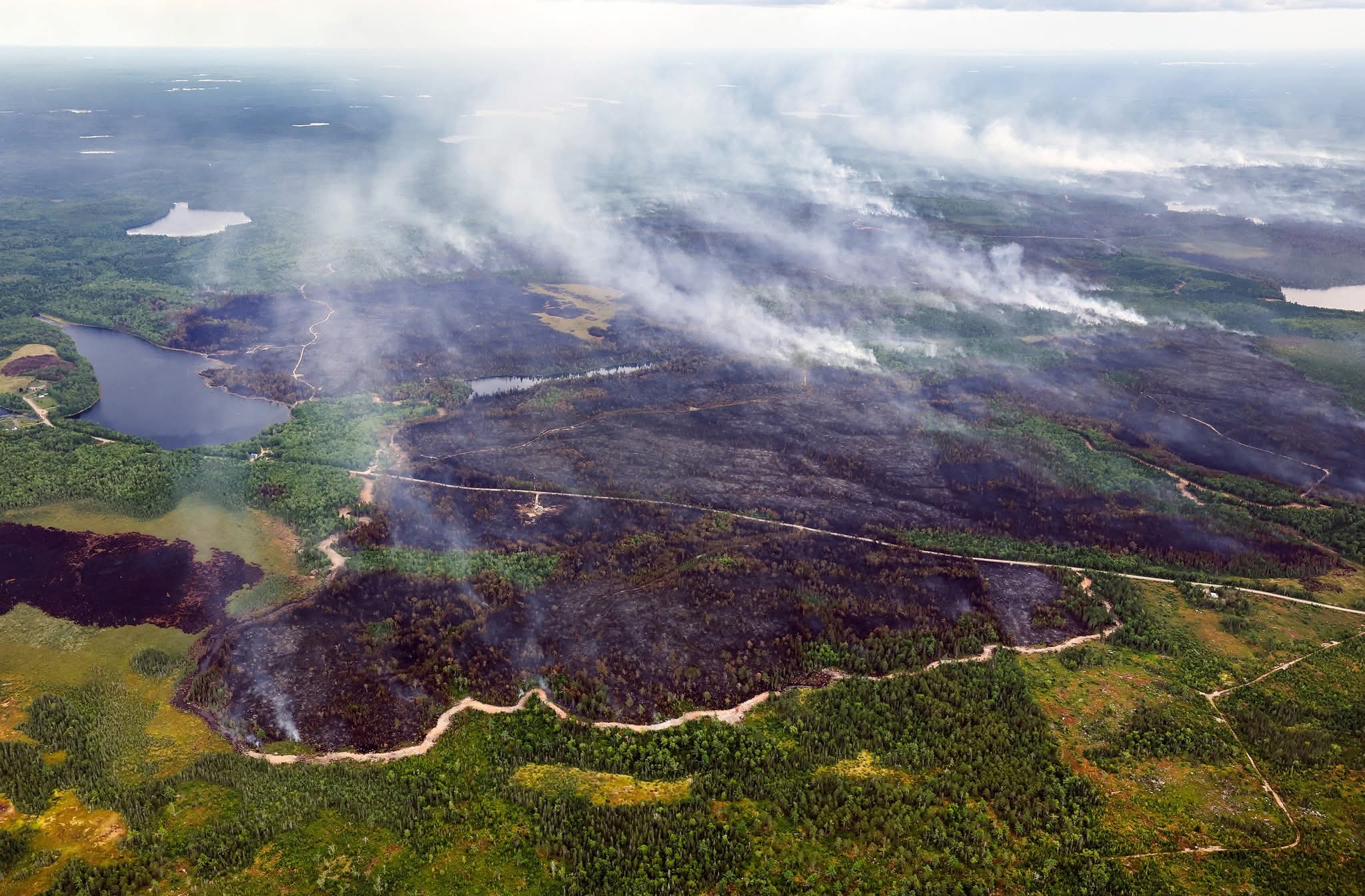 Dozer guards and hose lines are some of the many wildfire suppression methods used by DNR firefighters as they battle the Long Lake wildfires