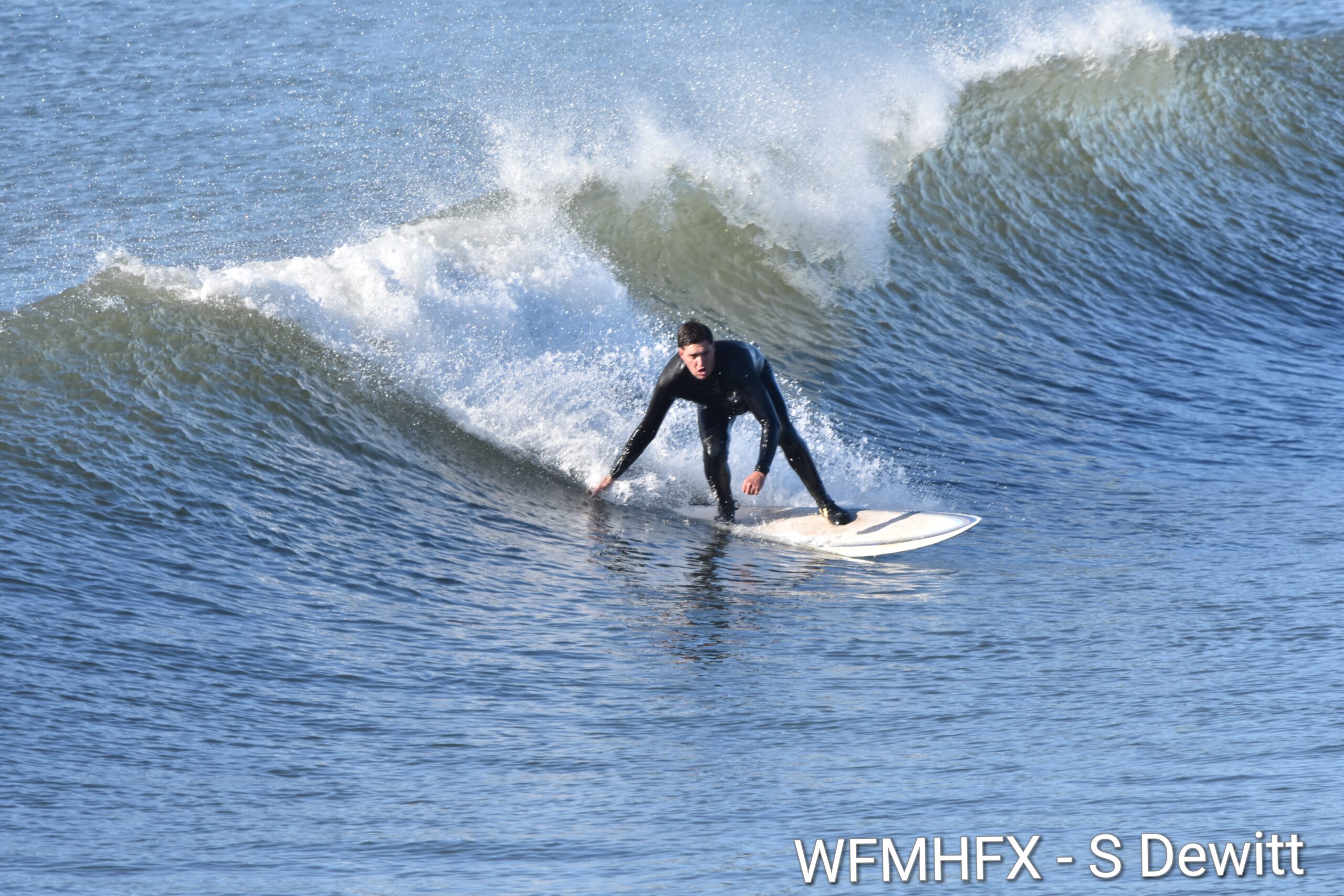 In photos - Morning surfers took advantage of a beautiful fall day in Cow Bay