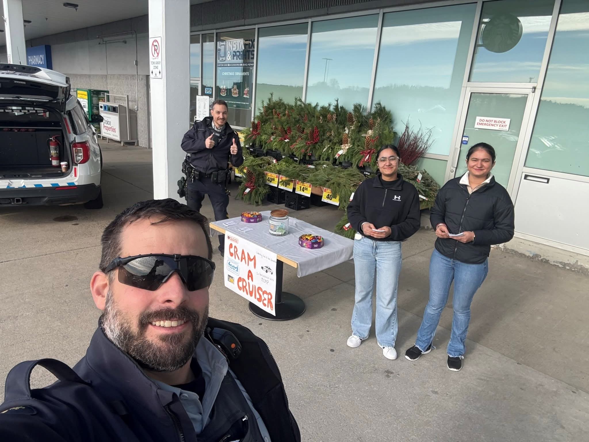 Today RCMP NS Community Action and Response Team (CART) members from #Sackville are collecting food donations in support of Feed Nova Scotia