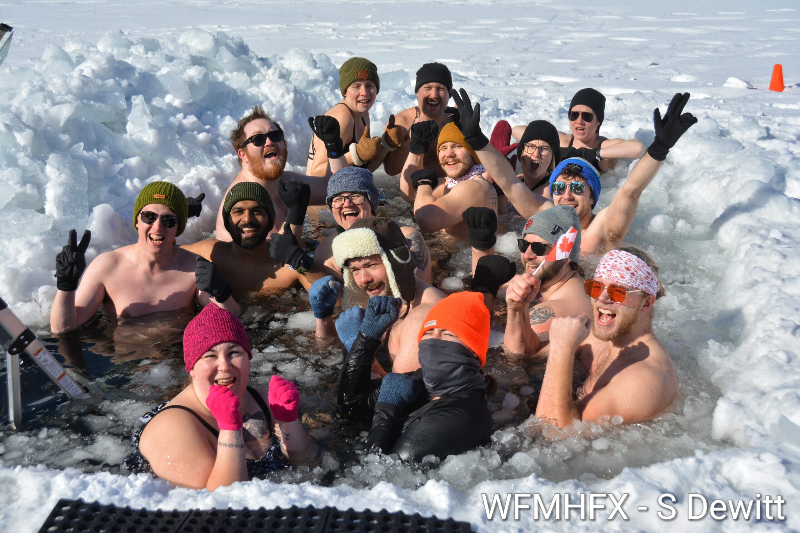 In photos - Sunday splash day as the Darkside Dippers plunge on! Smile as the Darkside Dippers take on the chilly waters of Lake Banook!