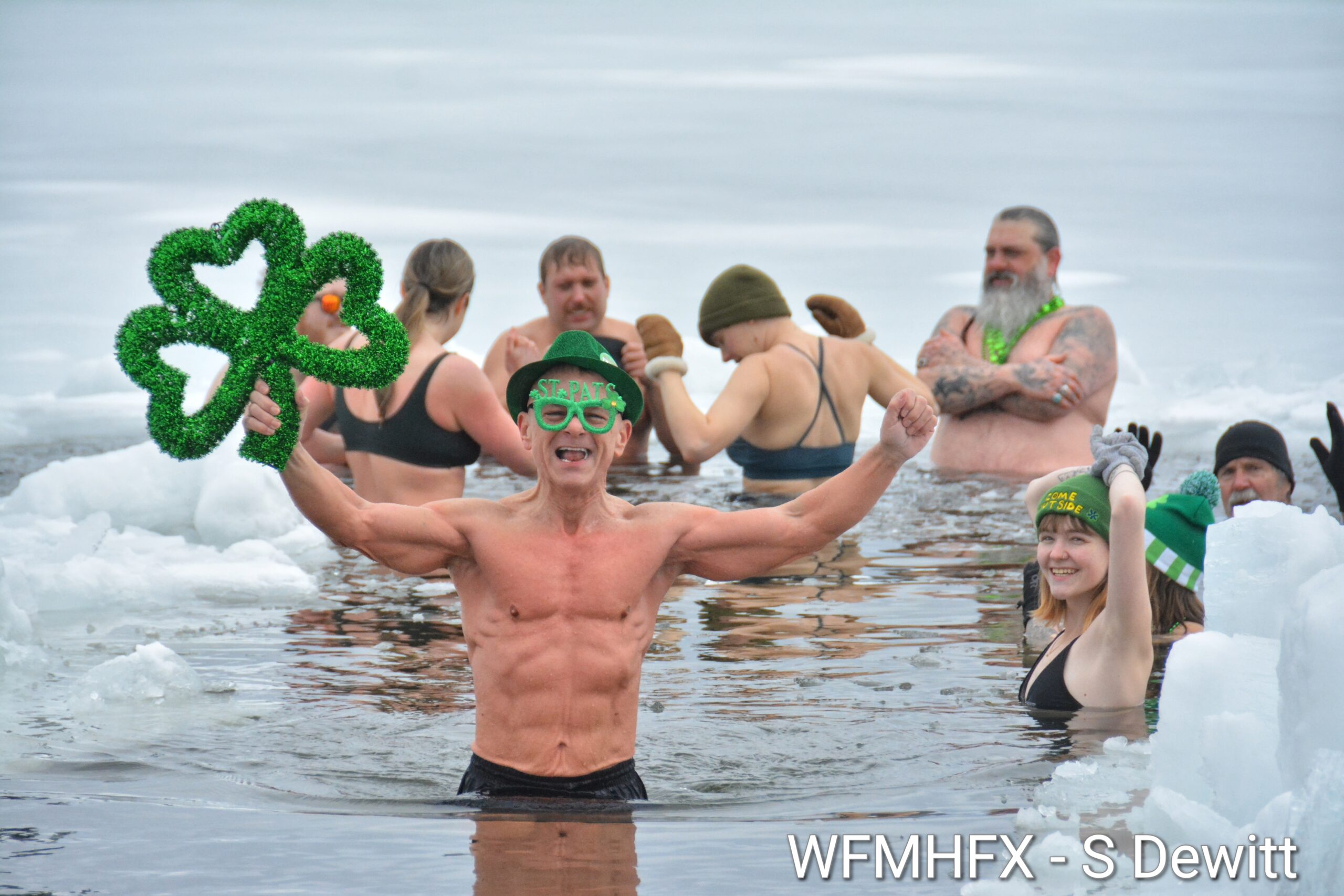 In photos - Not a pot of gold, but a chilly dipper feeling the chill of the Irish on this St Patrick's Day Greenside dip!  