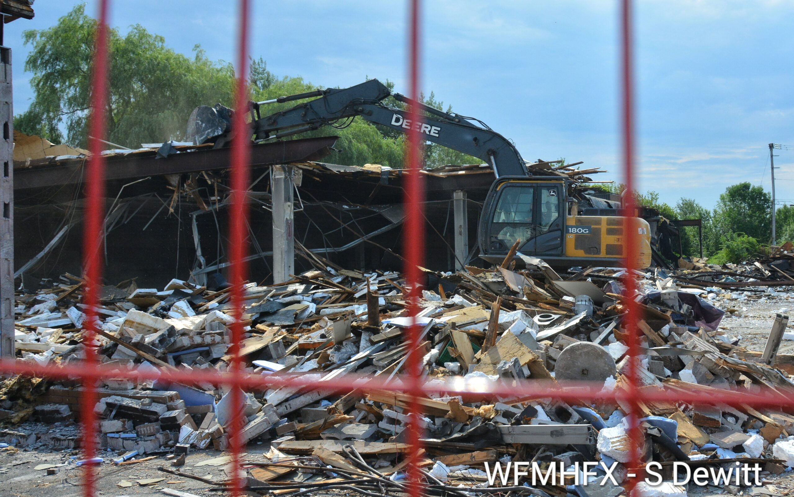Fire damaged building in Dartmouth being torn down