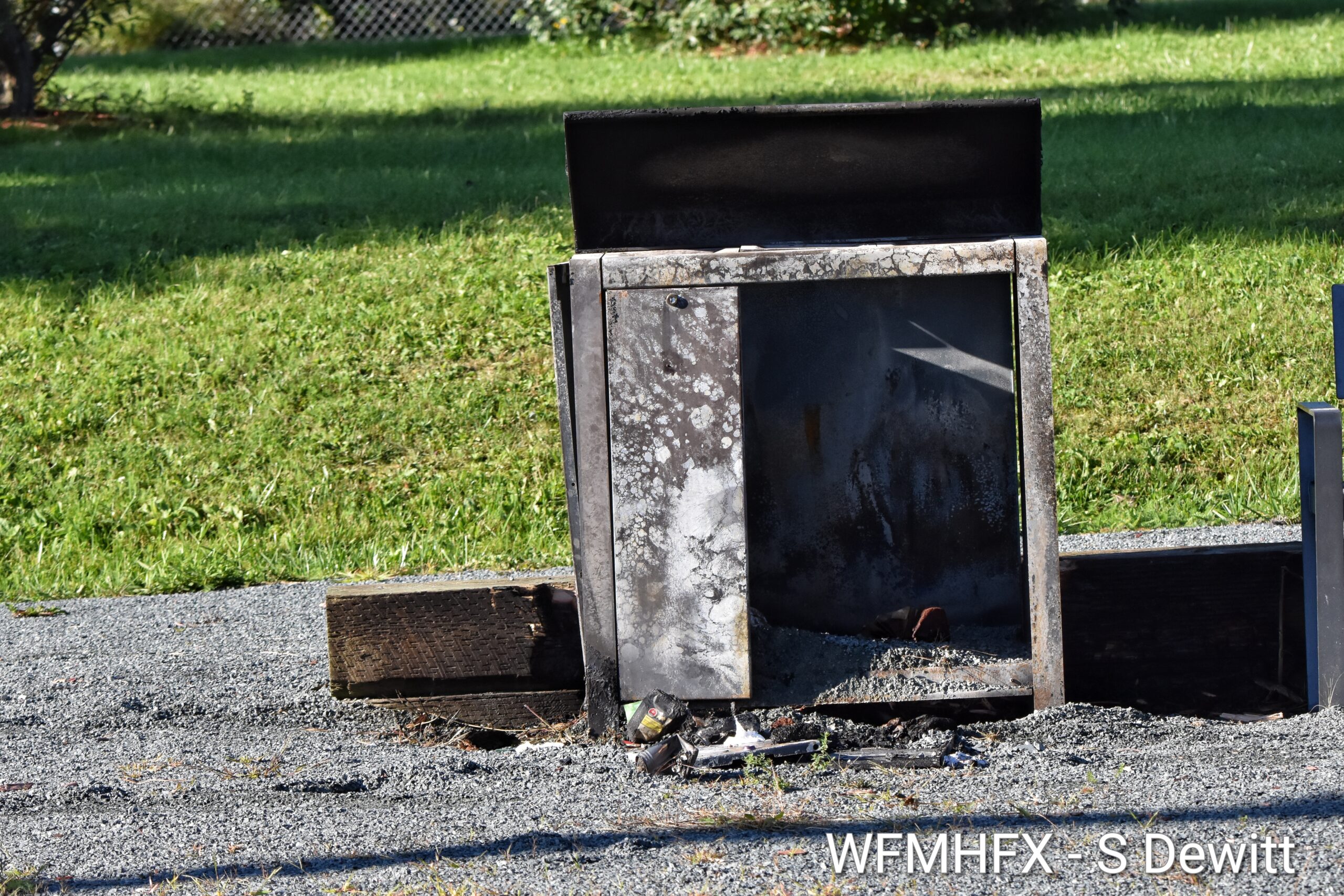 Park users are urged to use caution after garbage bins set on fire
