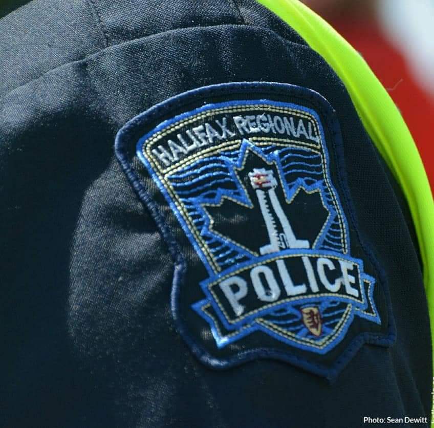 Police have a charged a man and a woman with firearm offences following a search in Halifax
